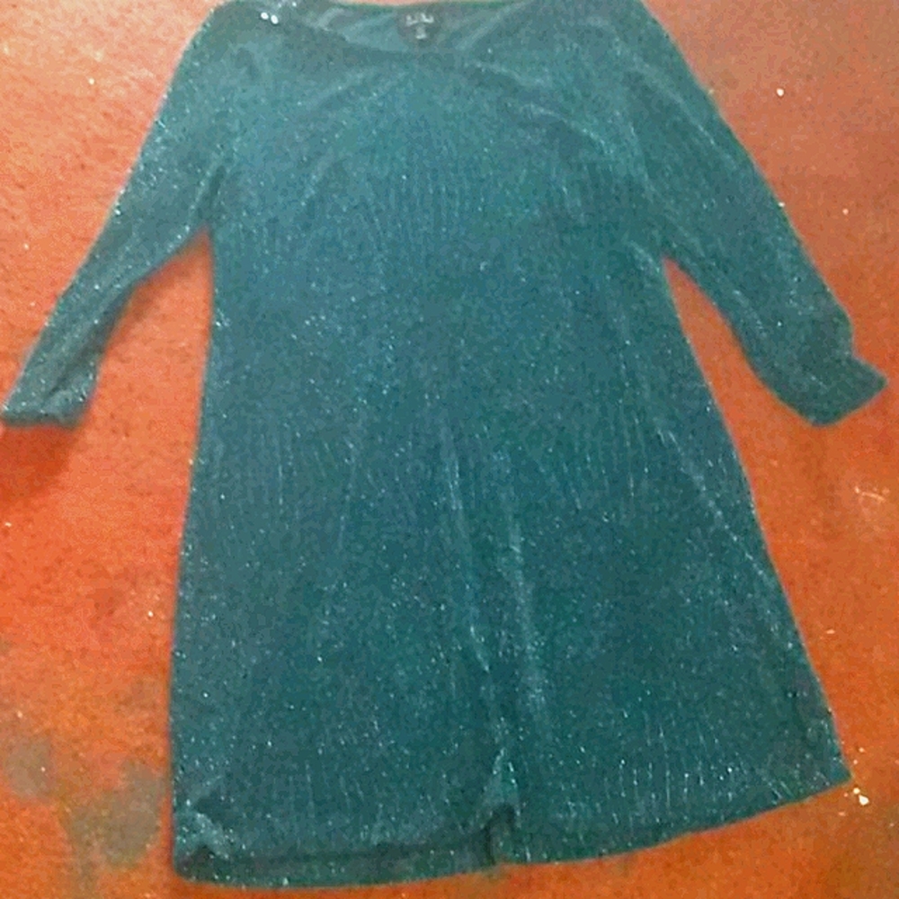 A green long sleeve dress